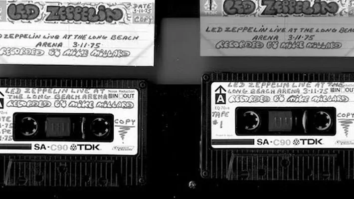 Reclusive, genius, paranoid, obsessive, legendary… // Mike Millard earned his “Mike the Mike” nickname by taping now-legendary shows by some of the biggest names in 1970s rock music. For Millard, taping concerts was his life. A perpetual recluse, Mike obsessed over his tapes and their destinies. But in 1990, it all came to a tragic end. The tale of Mike Millard is one that has been whispered in underground circles for decades, perhaps now it’s time for him to receive the recognition he never saw in his lifetime.